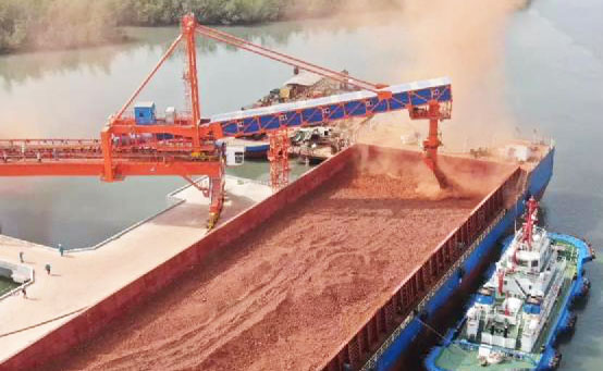 Bauxite is being uploaded to barge